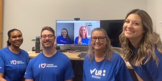 Team picture on "Dress in Blue Day".